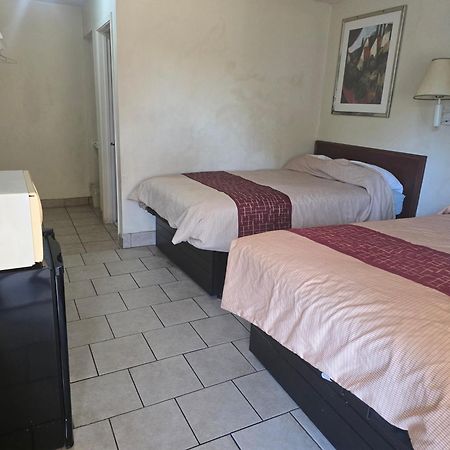 Carpet Inn Опелика Экстерьер фото