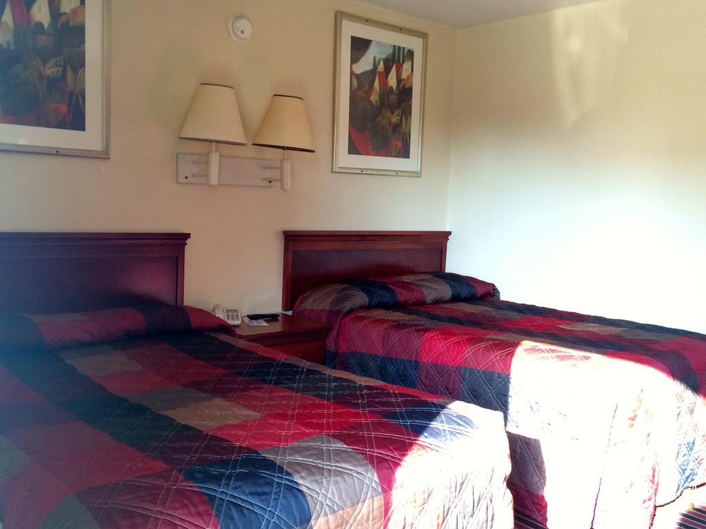 Carpet Inn Опелика Экстерьер фото