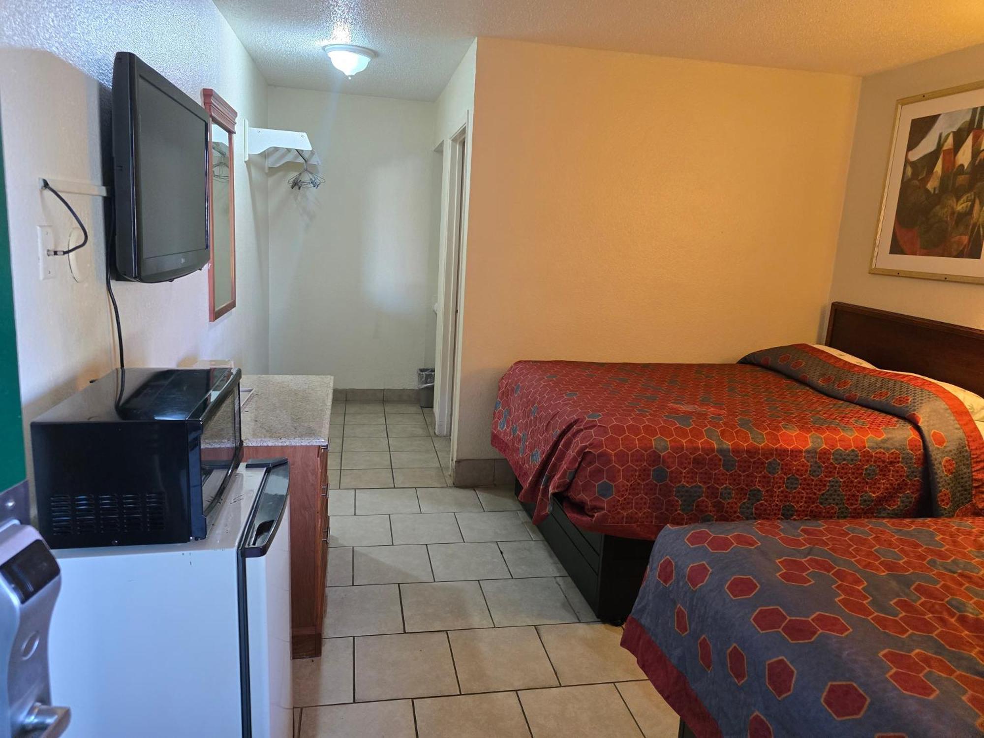 Carpet Inn Опелика Экстерьер фото