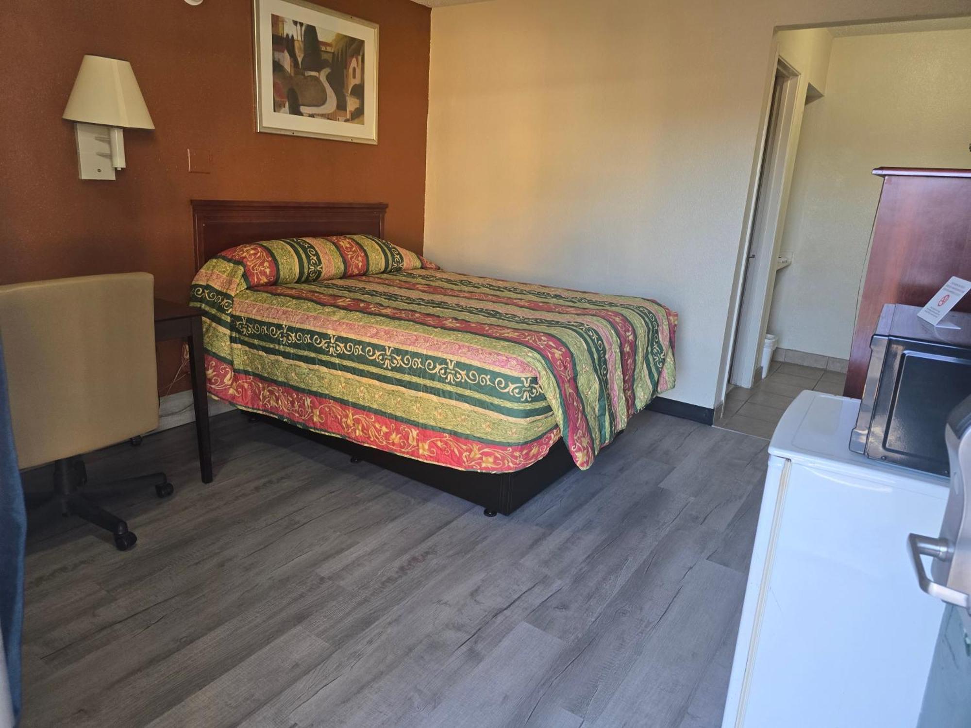 Carpet Inn Опелика Экстерьер фото