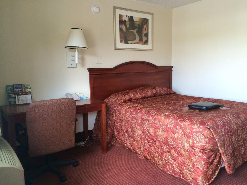 Carpet Inn Опелика Экстерьер фото