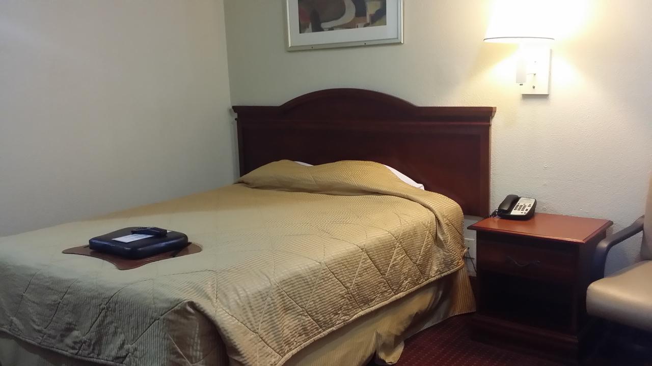 Carpet Inn Опелика Экстерьер фото