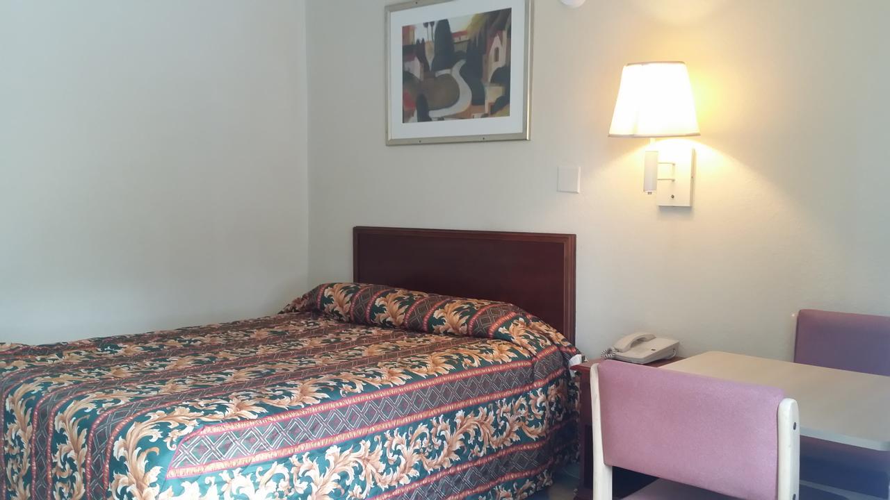 Carpet Inn Опелика Экстерьер фото
