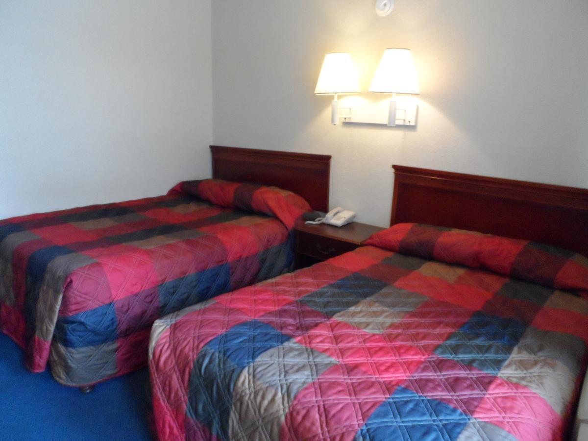 Carpet Inn Опелика Экстерьер фото