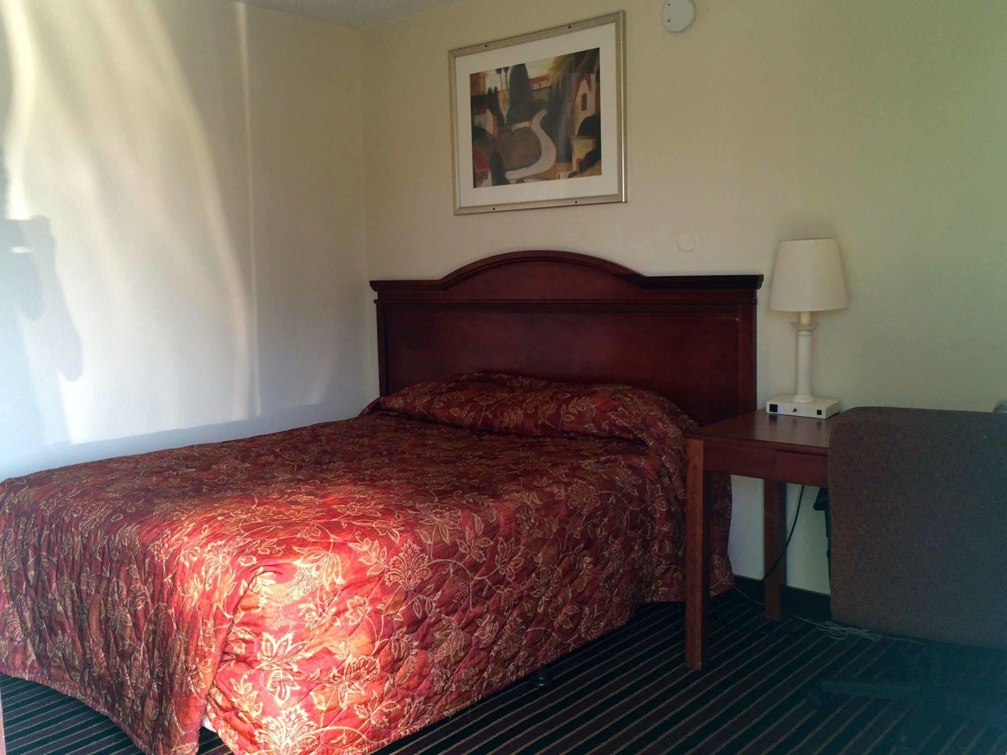 Carpet Inn Опелика Экстерьер фото